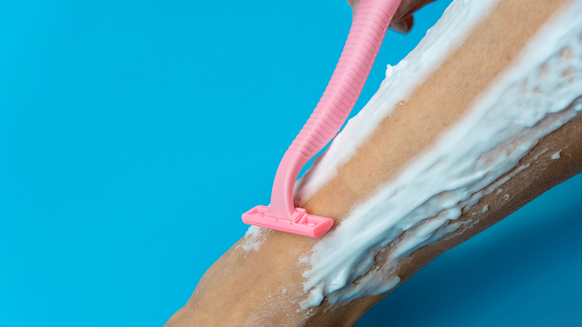 pink razor shaving leg